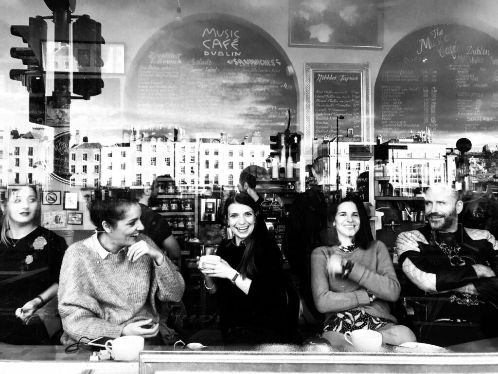 black and white documentary photograph of people in a Dublin café, street
photography workshop with Brendan Ó Sé